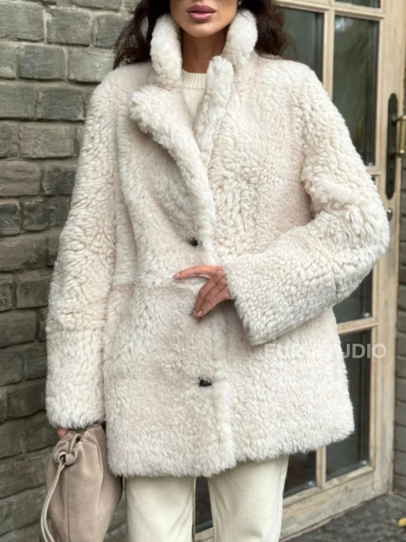 Женская дубленка - мех тиградо