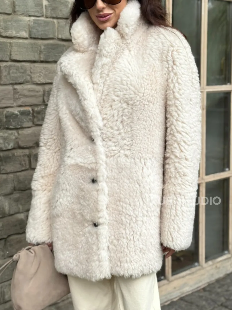 Женская дубленка - мех тиградо