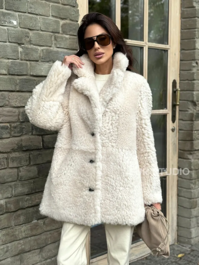 Женская дубленка - мех тиградо