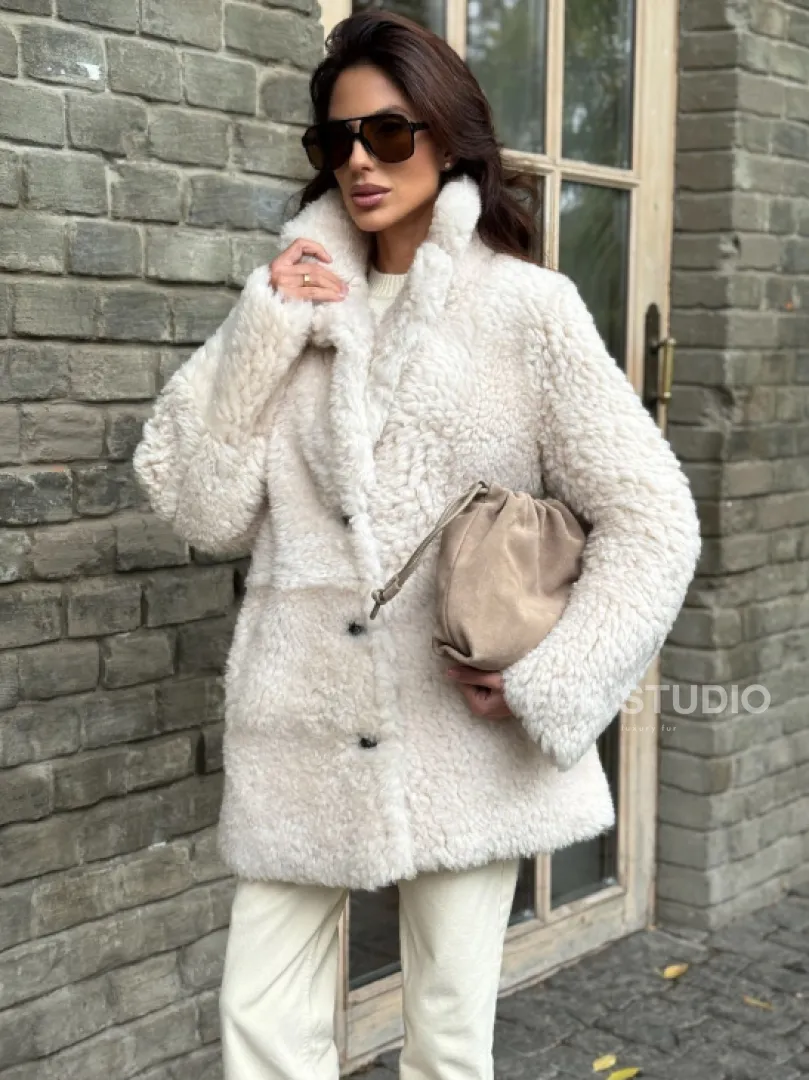 Женская дубленка - мех тиградо