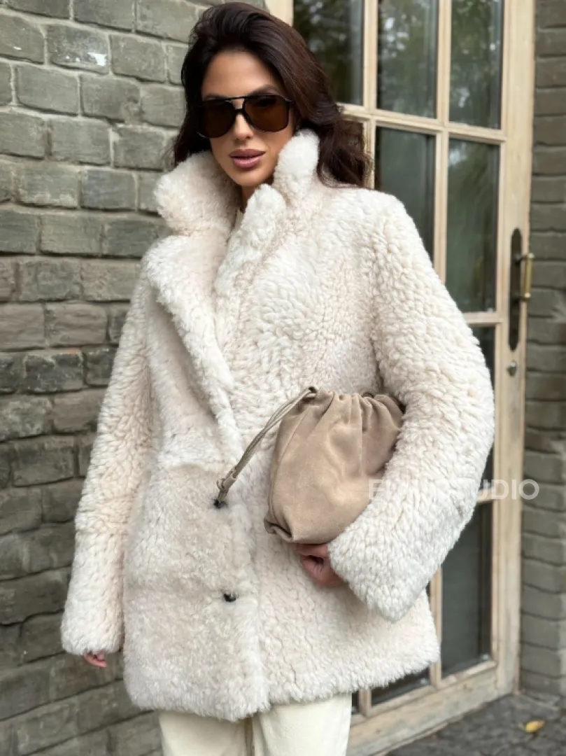 Женская дубленка - мех тиградо