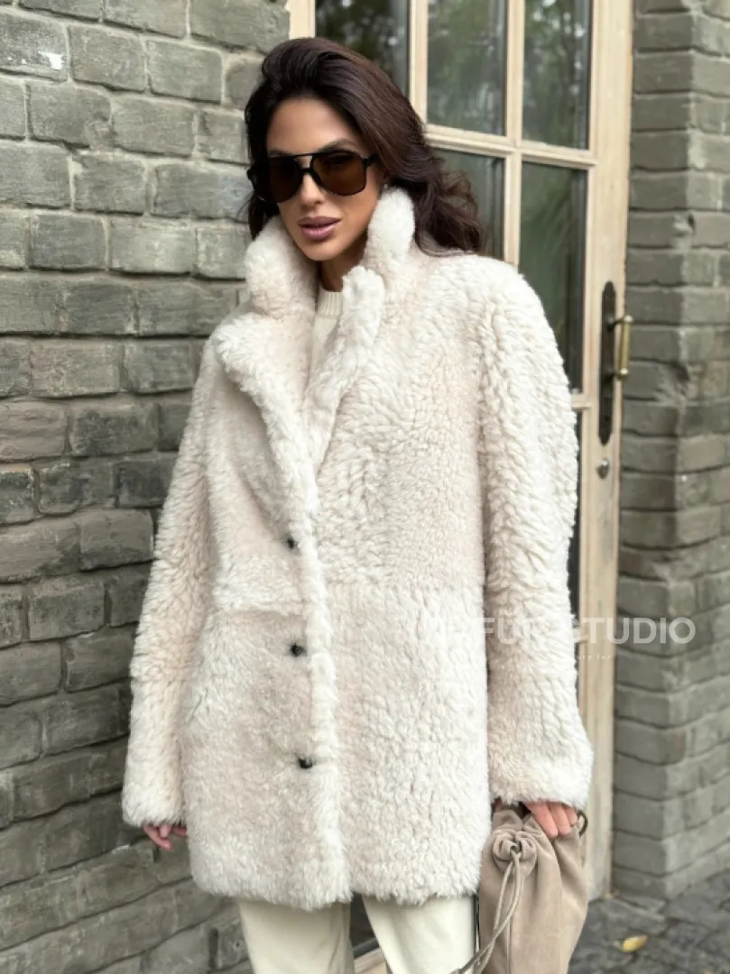 Женская дубленка - мех тиградо