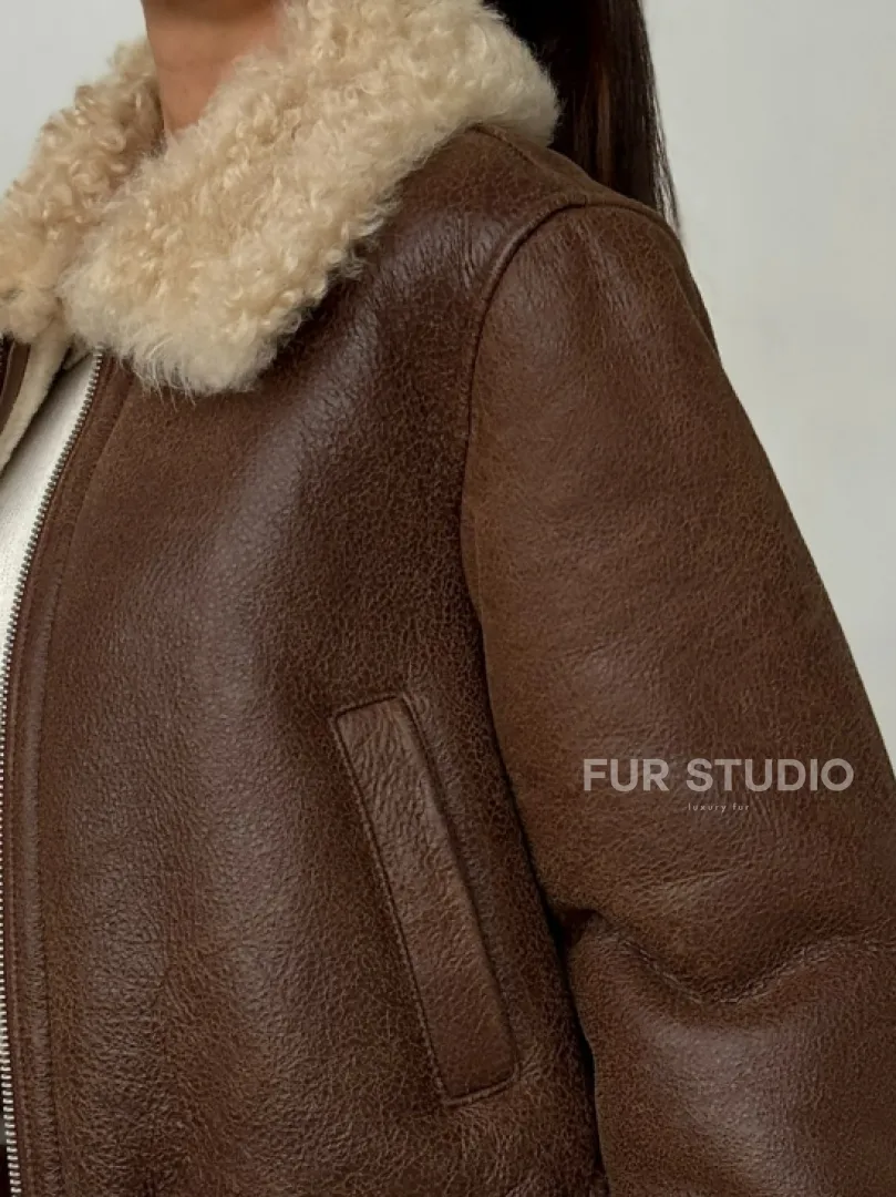 Короткая дубленка - женская