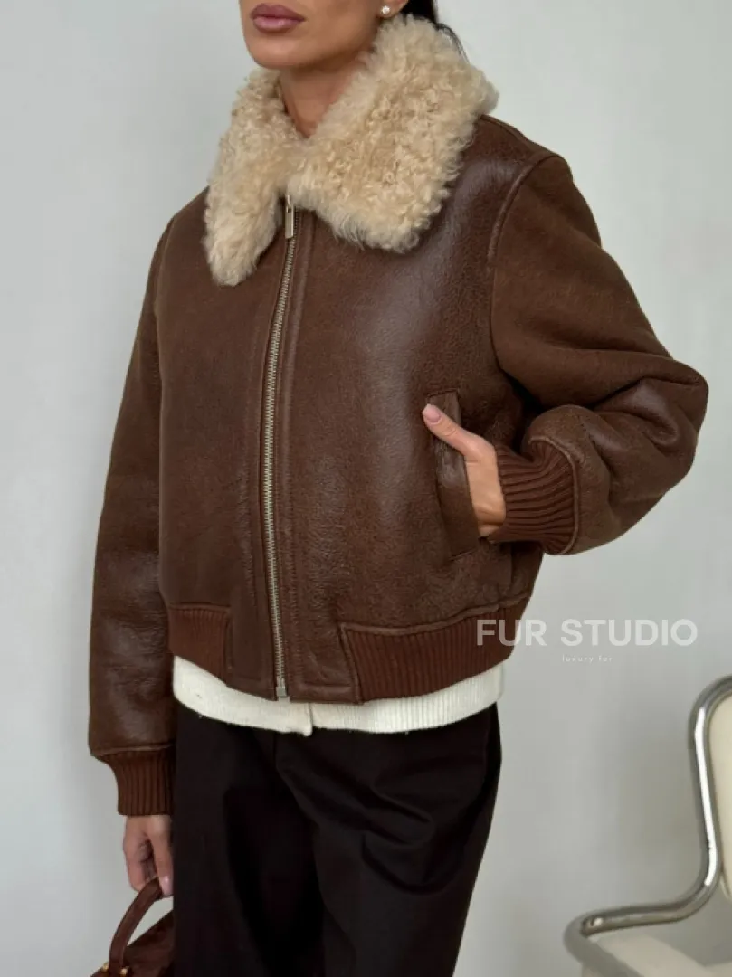 Короткая дубленка - женская