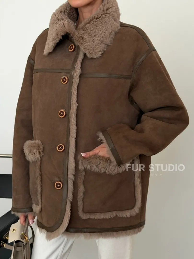 Коричневая замшевая дубленка на мехе тиградо