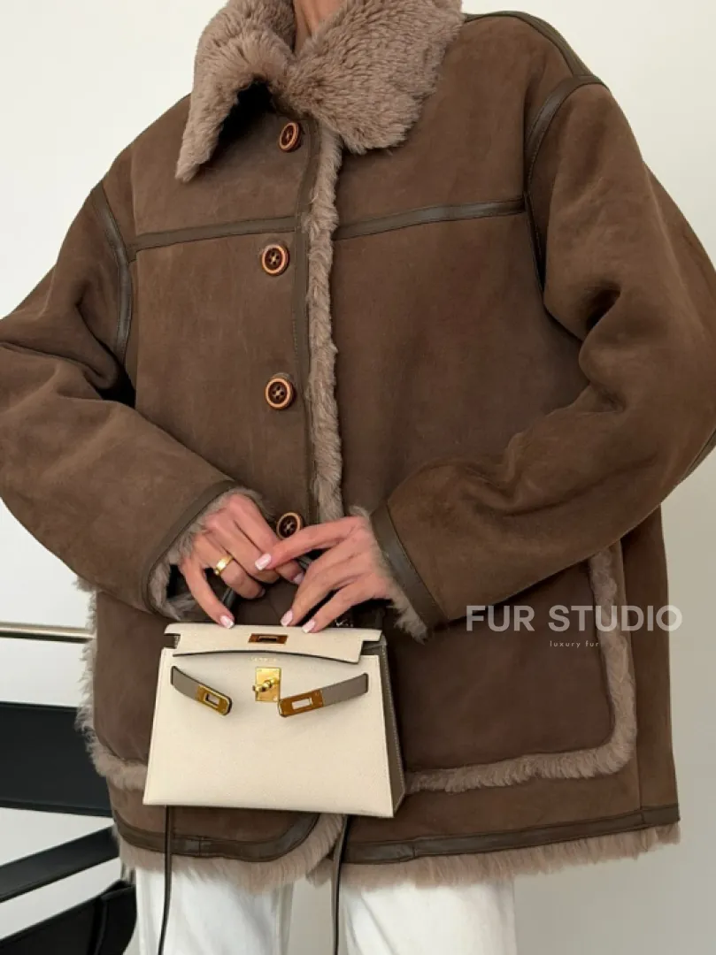 Коричневая замшевая дубленка на мехе тиградо