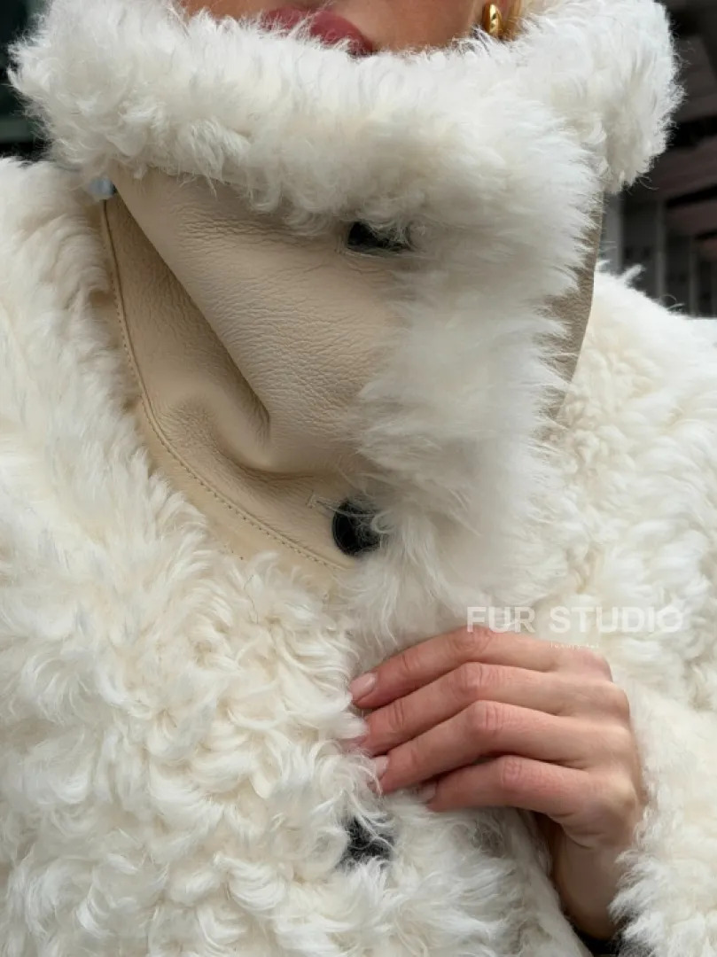 Белая шубка из тиградо