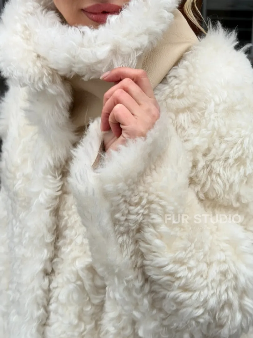 Белая шубка из тиградо