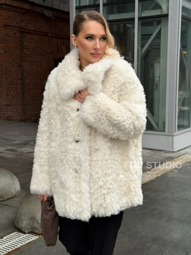 Белая шубка из тиградо