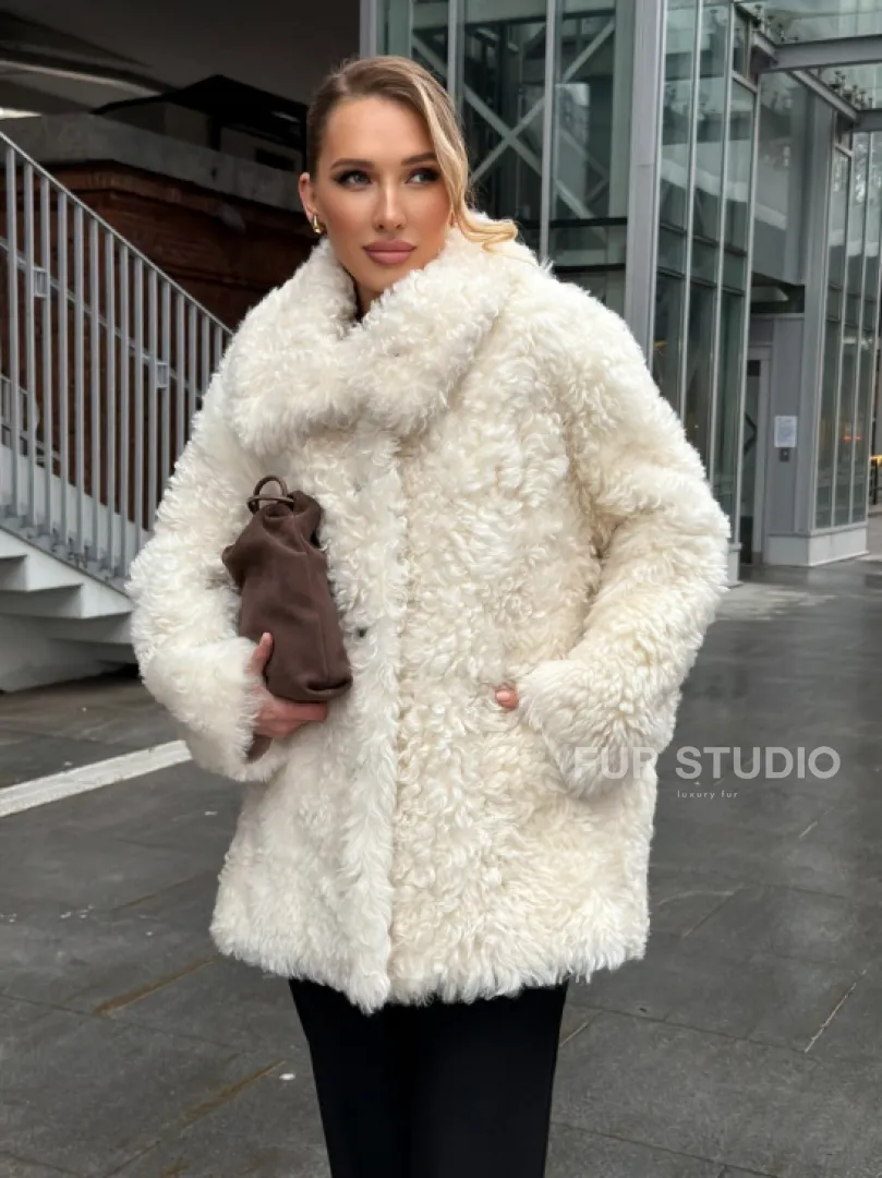 Белая шубка из тиградо