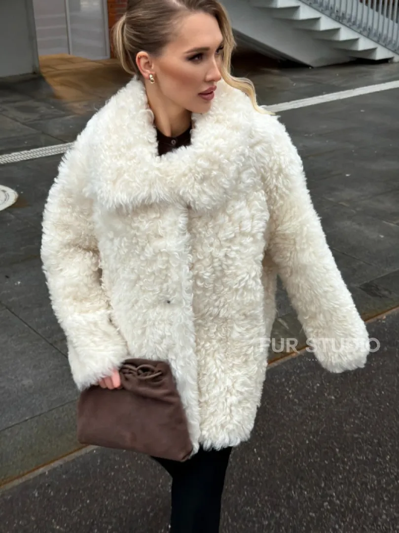 Белая шубка из тиградо