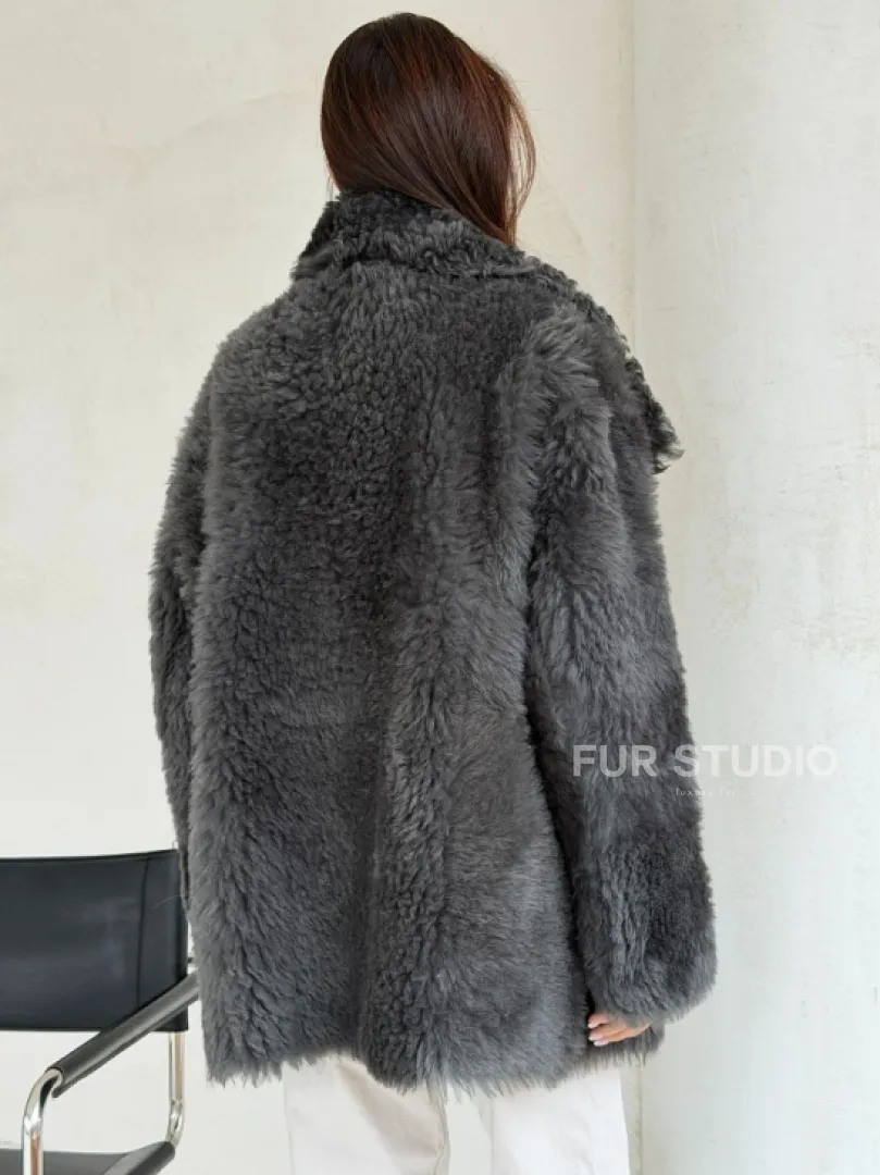 Серая дубленка из тиградо