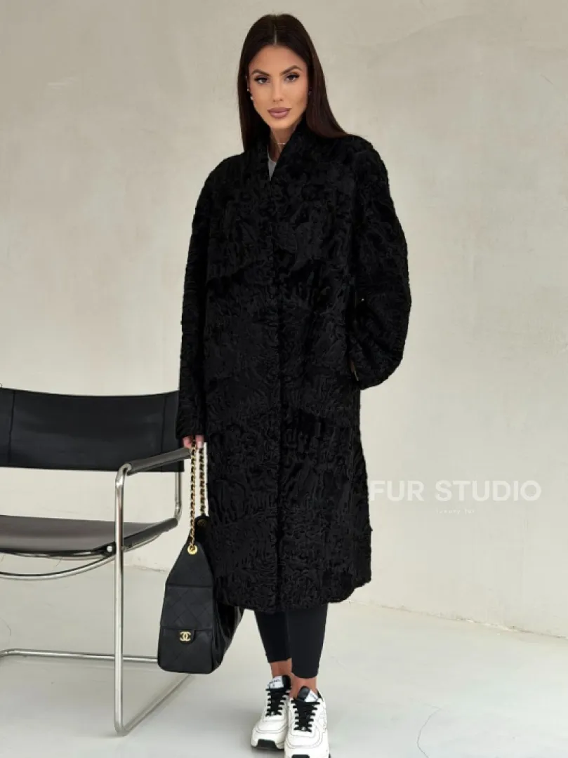 Черная шуба из каракуля