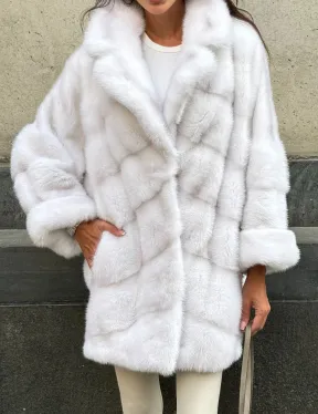 Светлый полушубок из натурального меха норки, английский воротник