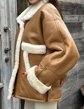 Модная куртка - дубленка в стиле «Oversize» на пуговицах и манжетами на рукавах