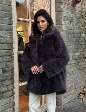 Норковый женский полушубок с капюшоном в графитом цвете