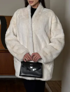 Светлый норковый полушубок жакет с V-образным воротником