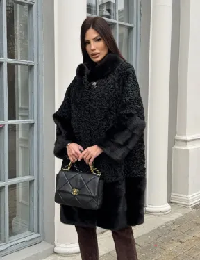 Черная шуба из меха каракульчи с отделкой из меха норки