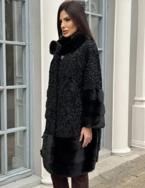 Черная шуба из меха каракульчи с отделкой из меха норки