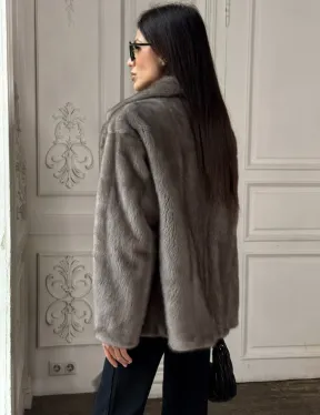 Норковый жакет классического кроя с прорезными карманами клапанами