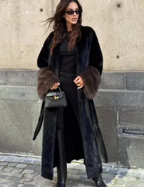 Длинная черная норковая шуба с манжетами из меха куницы