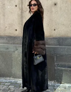 Длинная черная норковая шуба с манжетами из меха куницы