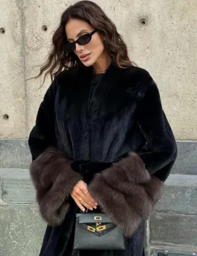 Длинная черная норковая шуба с манжетами из меха куницы