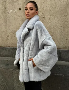 Элегантный полушубок из скандинавской норки небесно-голубого оттенка