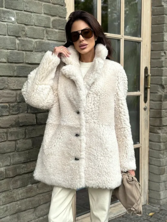 Женская дубленка - мех тиградо