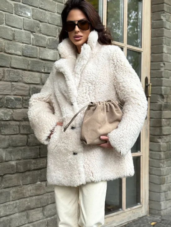 Женская дубленка - мех тиградо