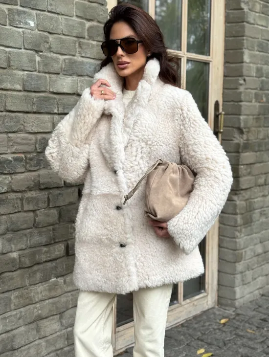 Женская дубленка - мех тиградо