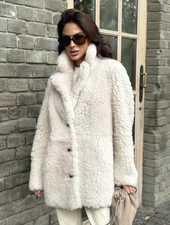 Женская дубленка - мех тиградо