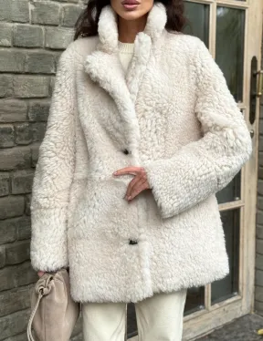 Женская дубленка - мех тиградо