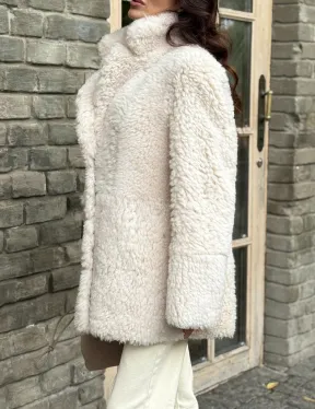 Женская дубленка - мех тиградо