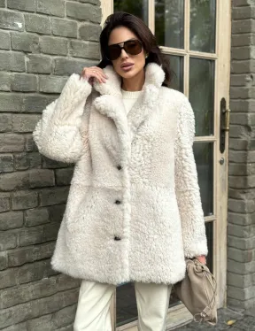 Женская дубленка - мех тиградо