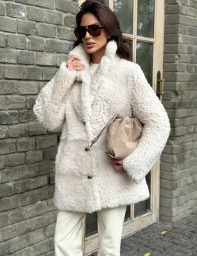 Женская дубленка - мех тиградо