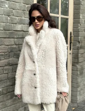 Женская дубленка - мех тиградо