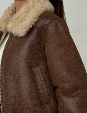 Короткая дубленка - женская