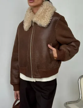 Короткая дубленка - женская