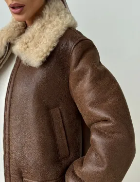 Короткая дубленка - женская