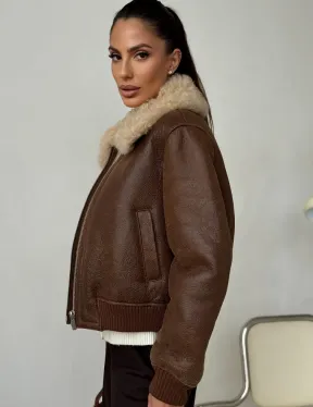 Короткая дубленка - женская