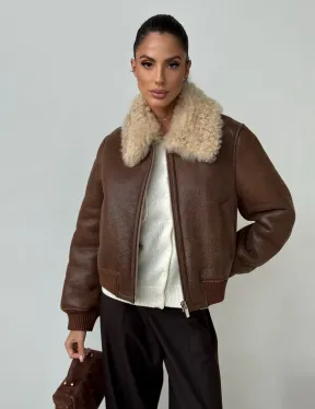 Короткая дубленка - женская