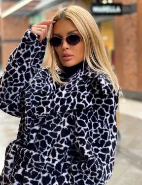 Двубортное пальто из экомеха