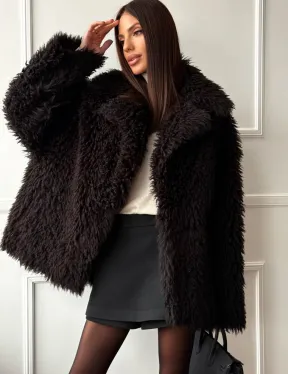 Коричневая дубленка из меха Тиградо