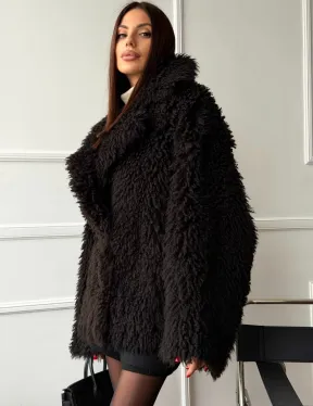 Коричневая дубленка из меха Тиградо