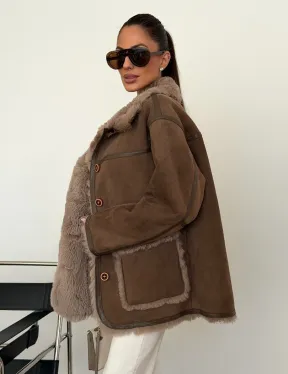 Коричневая замшевая дубленка на мехе тиградо