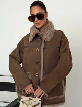 Коричневая замшевая дубленка на мехе тиградо