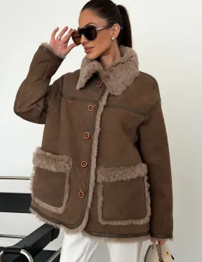 Коричневая замшевая дубленка на мехе тиградо