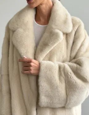 Женский норковый полушубок