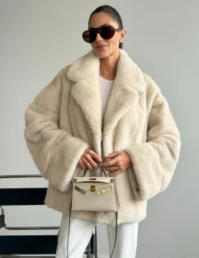 Женский норковый полушубок